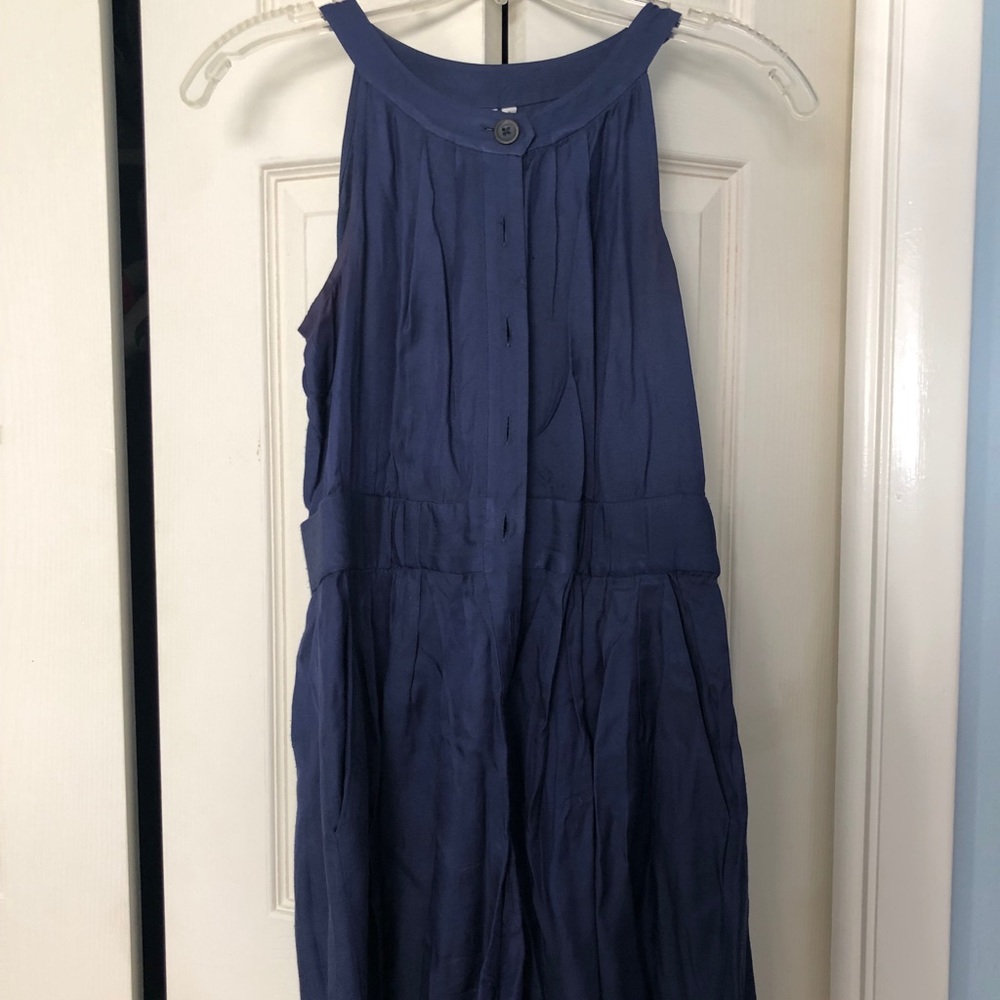 Blue button down romper by Anthropologie